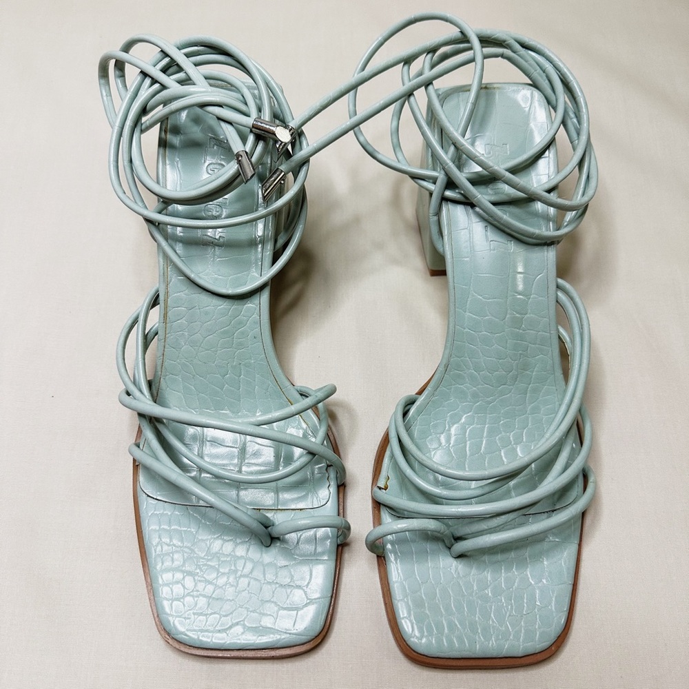 Strappy heels sandals in mint croc.